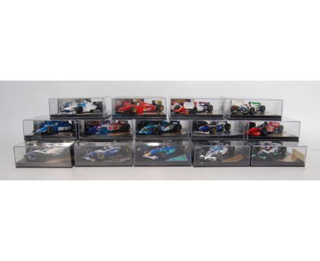 14 various plastic cased Onyx 1/43 scale F1 diecasts, examples to include a Ligier Renault JS39 and various others