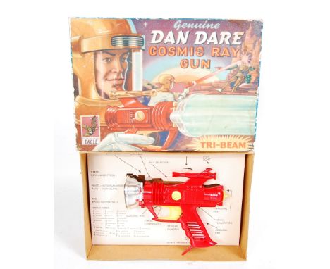 A rare Dan Dare Cosmic Ray Gun by Pallitoy dated 1953 comprising red and yellow body with chrome fittings in the original all