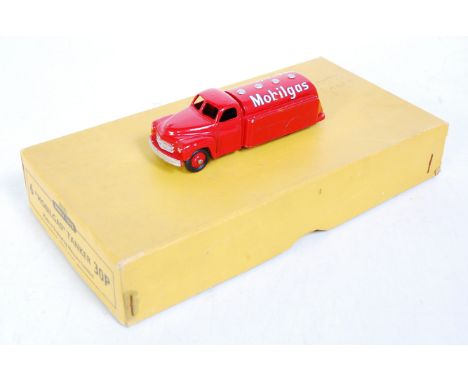 A Dinky Toys trade box No. 30P Studebaker Mobil Gas tanker trade box containing one example finished in red with Mobil Gas li