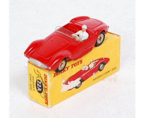 A French Dinky Toys No.22A Maserati Sport 2000, comprising red body with white driver and chrome hubs, in original all-card b