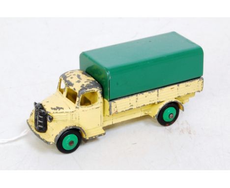 Dinky 412 very rare Austin Wagon, pale lemon yellow body, mid green hubs with major play wear, particularly on cab roof. A re