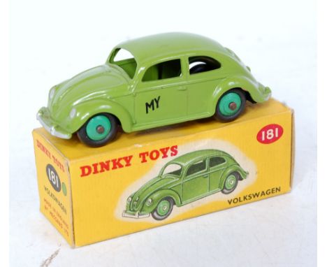 A Dinky Toys No. 181 Volkswagen saloon comprising green body with mid green hubs, in the original correct colour spot all-car