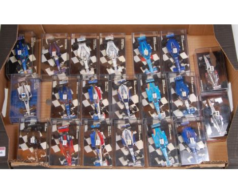 20 various plastic cased Minichamps 1/43 scale F1 diecasts examples to include a Prost Peugeot AP03, a Simtek Ford S941, and 