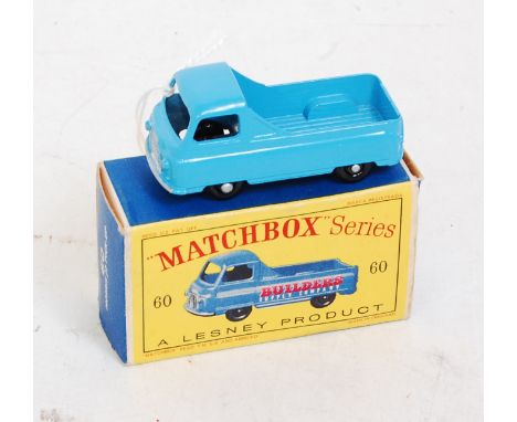 A Matchbox 1/75 series No. 60A Morris J2 pickup comprising light blue body with black plastic wheels, cast rear window, oppos