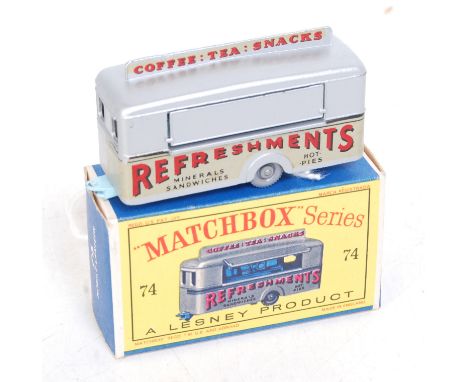 A Matchbox Regular Wheels No. 74A mobile refreshments canteen comprising silver body with grey plastic wheels, light blue bas