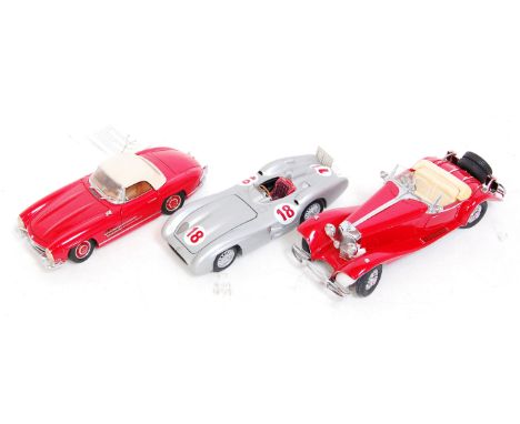 A loose Franklin Mint 1/24 scale diecast group, three examples to include a Mercedes 500K special roadster, a 1954 Mercedes B