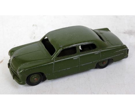 A Dinky Toys No. 139AM Canadian issue US Army staff car comprising of military green body without white stars on roof and doo