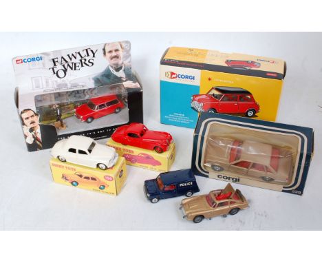 A collection of mixed boxed and loose Corgi Toys and Dinky Toys to include a Corgi No. AN02528 1961 Austin Seven Cooper, a lo