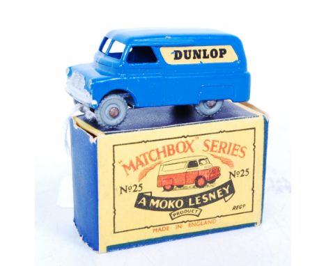 A Matchbox 1-75 series No. 25A Bedford Dunlop delivery van comprising dark blue body with Dunlop livery and metal wheels, in 