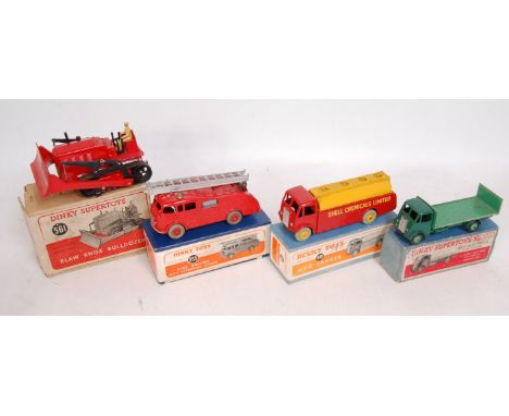 A Dinky Toys boxed commercial vehicle group to include No. 561 Blaw Knox bulldozer, No. 513 Guy flat truck with tail board, N