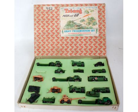 A Triang Minic Push-and-go army presentation gift set comprising a variety of 00/H0 scale plastic friction drive military veh