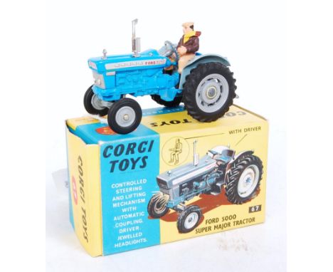 A Corgi Toys No. 67 Ford 5000 Super Major tractor comprising blue &amp; grey plastic hubs and driver figure, in the original 