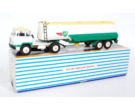 A French Dinky Toys No. 887 Unic Articulated BP tanker comprising white, green and lemon yellow cab and trailer with white pl