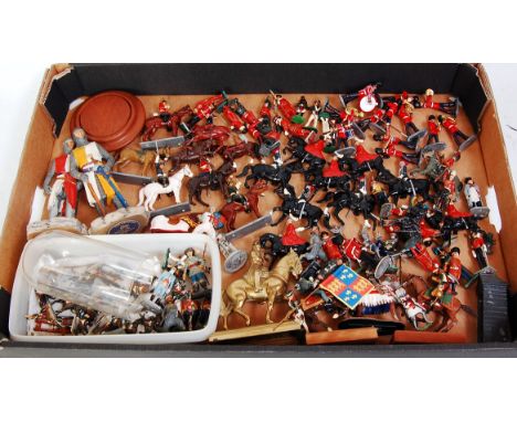 A collection of modern and vintage Britains and other white metal diecast and resin military figures to include Britains Beef