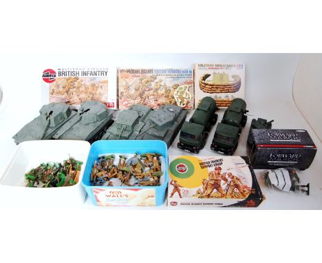 A quantity of mixed plastic and white metal Britains and other military figures and vehicles, to include two Britains milk ta