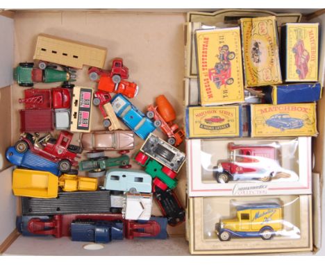 A box containing a quantity of Matchbox mixed release, modern issue diecast and empty Matchbox boxes, examples to include a N