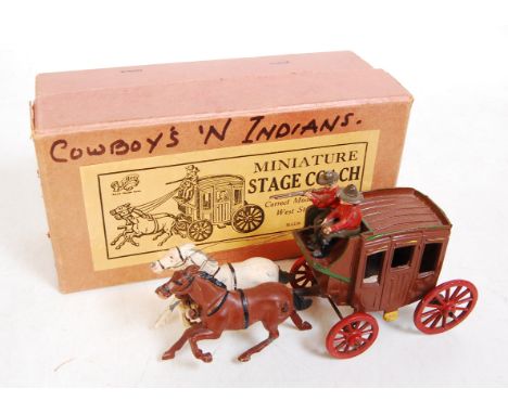 A pre-war John Hilco Wild West Stage Coach with driver and shotgun guard in the original labelled buff coloured box (VG,BVG)