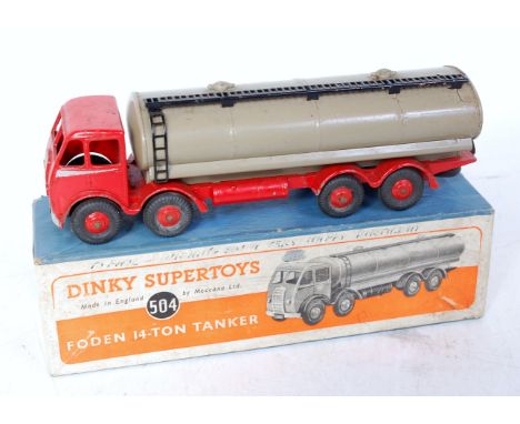 A Dinky Toys No. 504 Foden 14 ton tanker comprising of first type cab with red chassis and red hubs, with grey back, in the o