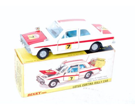 Dinky Toys No.205 Lotus Cortina Rally Car, white and red, with racing number 7, light blue interior, round shaped aluminium h