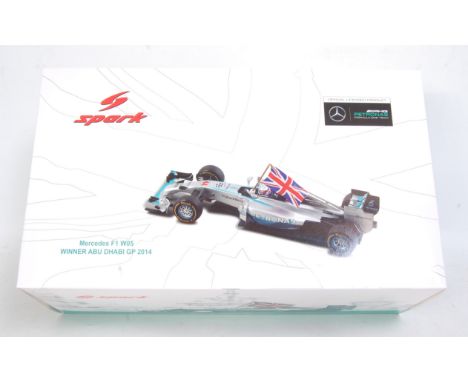 A Spark Models 1/18 scale resin model of a Mercedes F1 W05 F1 racing car, No. 44 Lewis Hamilton, winner Abu Dhabi Grand Prix 