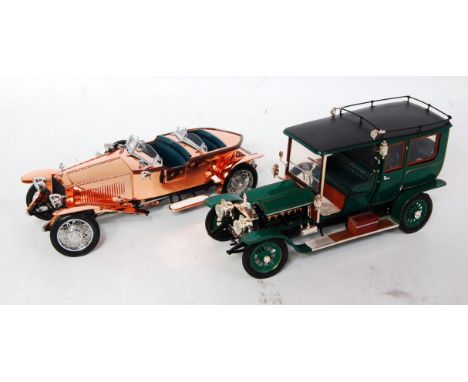 A Franklin Mint boxed 1/24 scale diecast group, two examples to include a 1921 Rolls Royce Silver Ghost, together with a 1907