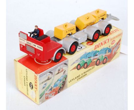 A Dinky Toys No. 936 Leyland 8-wheel chassis comprising silver and red body with red hubs and three yellow detachable five to