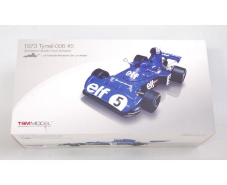 A True Scale Miniatures TSM model of a 1/18 scale 1973 Tyrrell 006 German Grand Prix winner No. 5 F1 racing car, appears as i