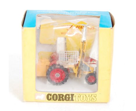 A Corgi Toys No.73 Massey Ferguson 165 tractor and saw attachment, in original blue and yellow window box (box window split, 