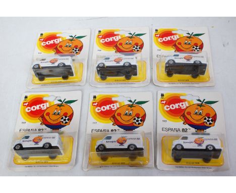 A Corgi Juniors trade pack of six No. 117 Spanish World Cup delivery vans, all housed on original backing cards with buff tra