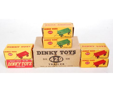 A Dinky Toys No. 429 complete trade box of six small trailers, housed in the original buff coloured trade box, six examples a