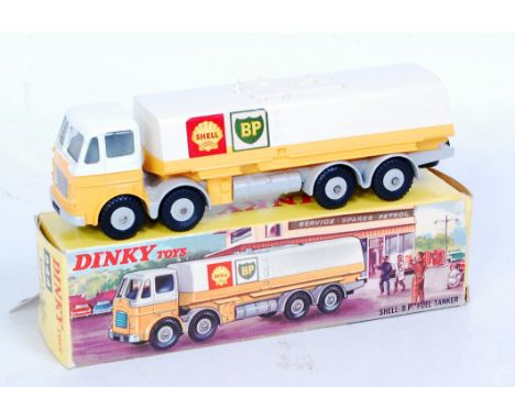 A Dinky Toys No. 944 Shell BP Fuel tanker comprising grey, yellow and white body with grey hubs, with windows version, in the