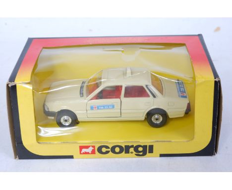 A Corgi Toys No. C450 Peugeot 505 Taxi with G7 radio stickers to door and boot, in the original window box (NM,BVG)