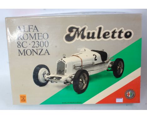 A Pocher 1/8 scale white metal, plastic and leather kit for an Alfa Romeo 8C 2300 Monza Muletto, appears as issued in origina