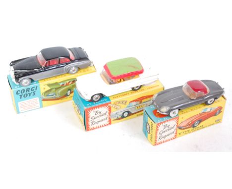 Three various boxed Corgi Toys playworn diecast to include No. 307 E-type Jaguar, No. 430 Bermuda taxi, and No. 224 Bentley C