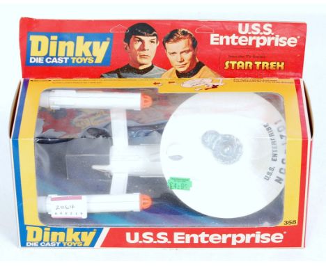 A Dinky Toys No. 358 USS Enterprise, appears as issued in original window box, comprising white body with orange fittings and