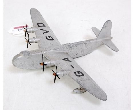 A Dinky Toys No. 701 Shetland Flying Boat comprising silver body with four black tinplate propellers, registration No. G-AGVD