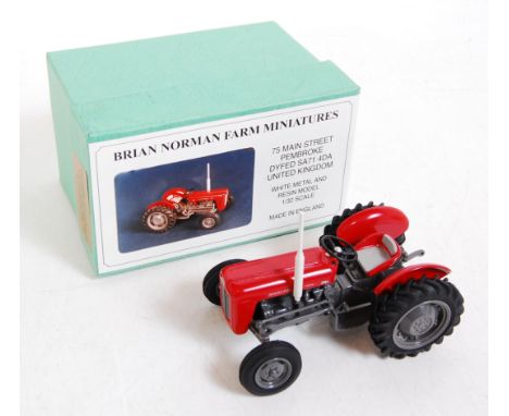 A Brian Norman farm miniatures 1/32 scale white metal and resin model of a Massey Ferguson 35 three-cylinder diesel tractor, 