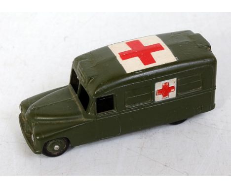 A Dinky Toys No. 30HM Daimler military ambulance, US export issue comprising military green body with red cross on white back