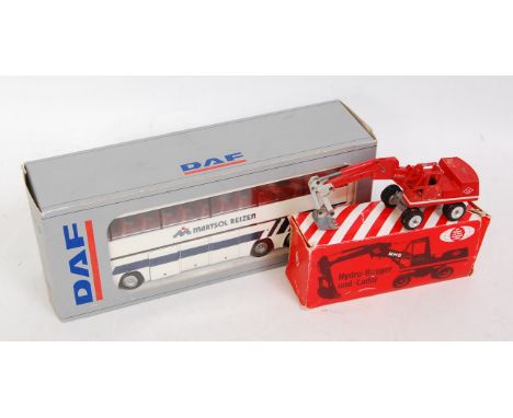 A Tekno 1/50 scale Marysol Reizen single decker coach finished in white and dark blue with brown interior, together with a O 