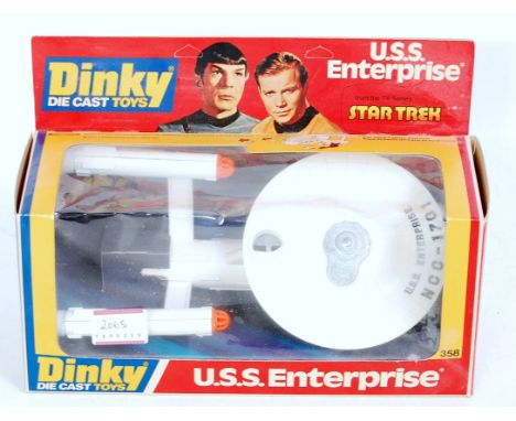 A Dinky Toys No. 358 USS Enterprise, appears as issued in original window box, comprising white body with orange fittings and