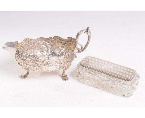 A silver lidded and cut-glass dressing table box
Of rectangular form, the lid with engine turned decoration, length 11cm, by 