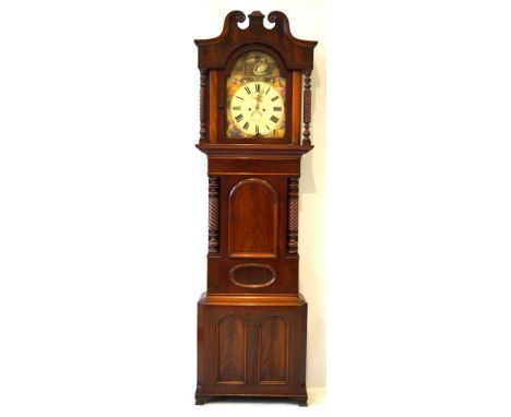 An early 19th Century Welsh mahogany cased eight day striking long case clock by J Hughes & Co of Carnavon 
The painted arche