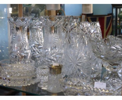 A Quantity of Cut Glass, including three cut glass vases together with a sweet meat dish on pedestal feet, two egg cups, bon 