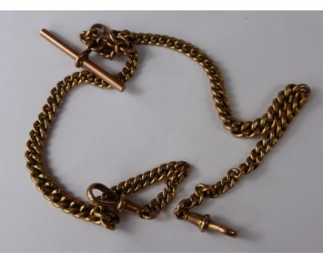 A 9 Ct Rose Gold Double Albert Fob Chain, approx 38 cms long, approx wt 43.5 gms.