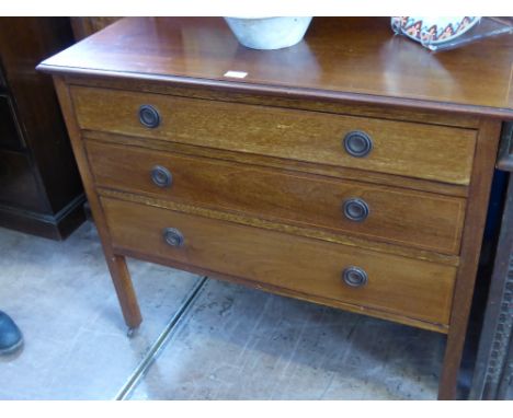 An Edwardian Mahogany Chest, with inlaid gallery and inlay to three drawers with ring handles, on casters, approx 92 x 47 x 8