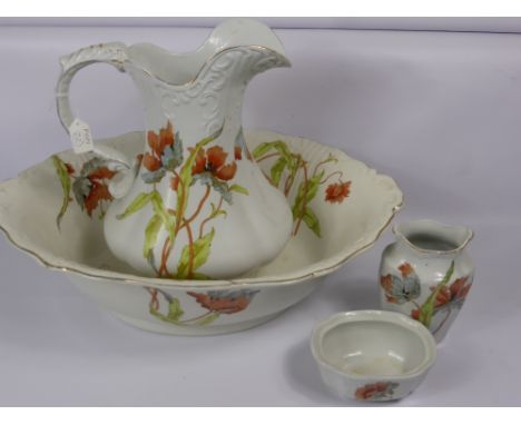 A Porcelain Toiletry Set, comprising oval water basin and jug, together with a small vase and soap dish. (4)