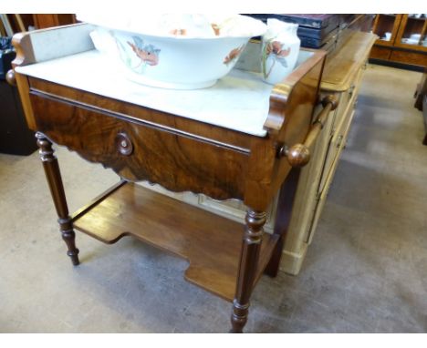 A Mahogany Marble Top Wash Stand, with carved towel rail, supported on turned legs with lower shelf, approx 38 x 80 82 cms.