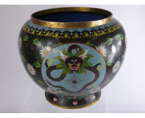 An Antique Qing Dynasty Chinese Cloisonné Jardiniere, of decorative design depicting a chasing dragon on vivid blue ground, w