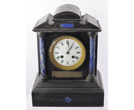 M.A. & Co., Slate Mantle Clock, with enamel front with gilt brass surround and Roman dial, Lapis Lazuli columns, strikes on a