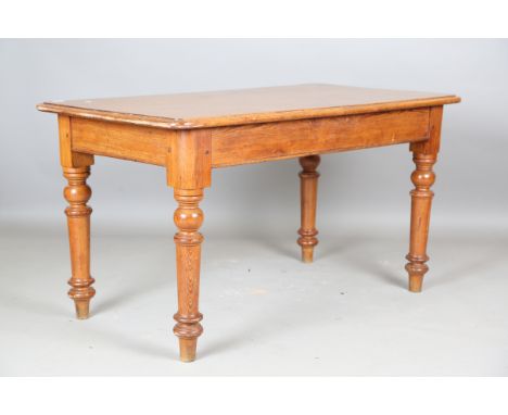 A mid-Victorian pitch pine farmhouse kitchen table, on turned tapering legs, height 74cm, length 137cm, depth 76cm.Buyer’s Pr